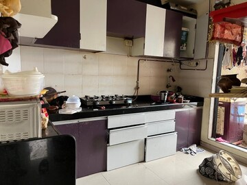 Kitchen in 2 BHK Apartment at Guru Mahima CHS, Sanpada – for Rent