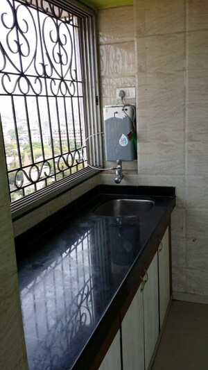 Kitchen in 1 BHK Apartment at Irfan Palace, Agripada – for Sale
