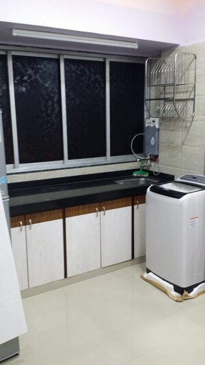 Kitchen in 1 BHK Apartment at Irfan Palace, Agripada – for Sale