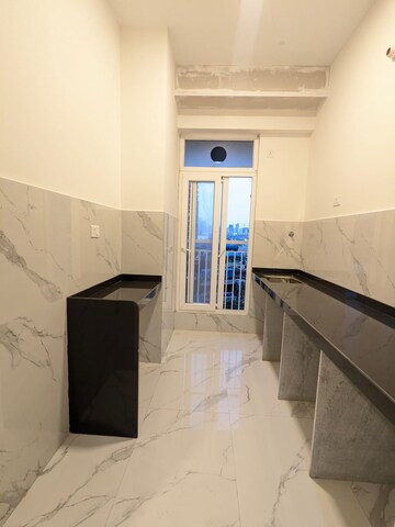 Kitchen in 1 BHK Apartment at Ruparel Sky Green, Kandivali West – for Sale
