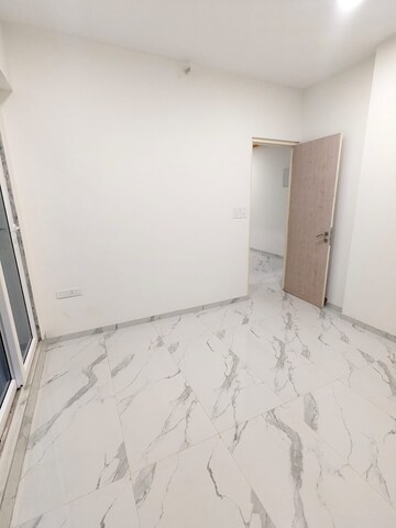 Room in 2 BHK Apartment at Ruparel Sky Green, Kandivali West – for Sale