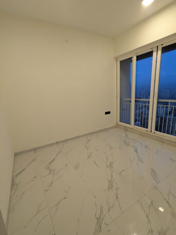 Room in 2 BHK Apartment at Ruparel Sky Green, Kandivali West – for Sale