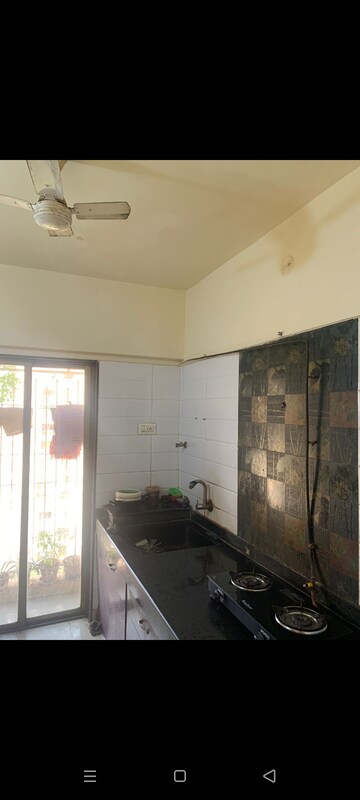 Kitchen in 2.5 BHK Apartment at Thane West – for Rent