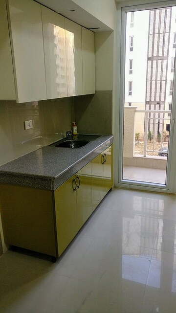 Kitchen in 4 BHK Apartment at Emaar Palm Hills, Sector 77 – for Rent