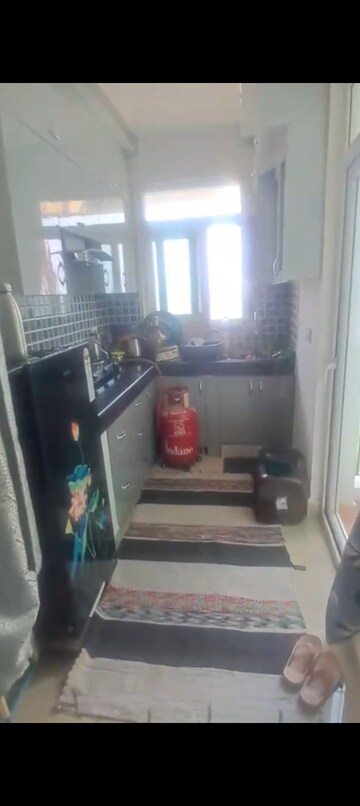 Kitchen in 2 BHK Apartment at Nilaya Greens, Raj Nagar Extension – for Sale