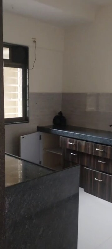 Kitchen in 2 BHK Apartment at Acme Ozone, Manpada – for Rent