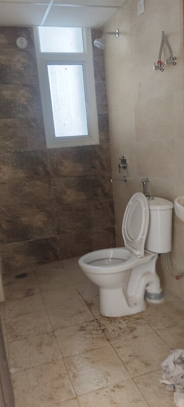 Bathroom in 3 BHK Apartment at Omaxe The Palace, Gomti Nagar – for Rent