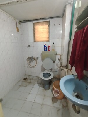 Bathroom in 2 BHK Apartment at Rutu Enclave, Kasarvadavali – for Sale