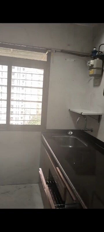 Kitchen in 2 BHK Apartment at Acme Ozone, Manpada – for Sale