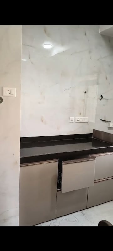 Kitchen in 2 BHK Apartment at Acme Ozone, Manpada – for Sale