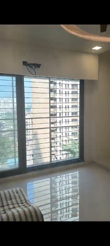 Room in 2 BHK Apartment at Acme Ozone, Manpada – for Sale