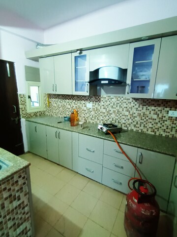Kitchen in 3 BHK Apartment at AWHO 8B, Vrindavan Yojna – for Rent