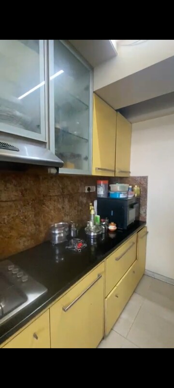 Kitchen in 3 BHK Apartment at Hiranandani Meadows, Manpada – for Rent