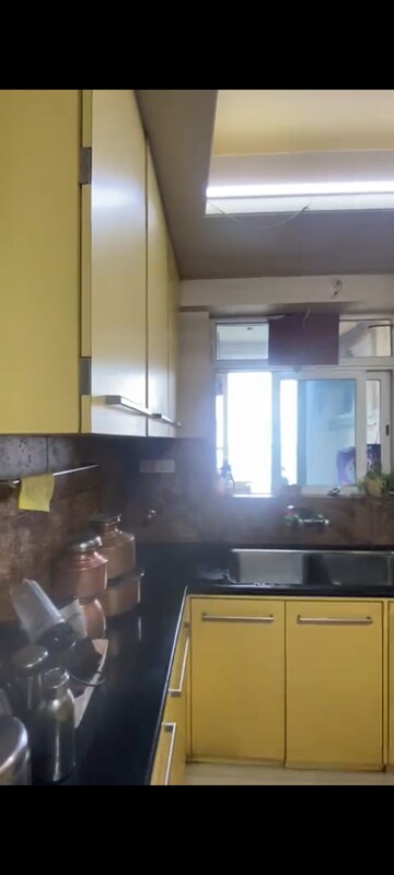 Kitchen in 3 BHK Apartment at Hiranandani Meadows, Manpada – for Rent