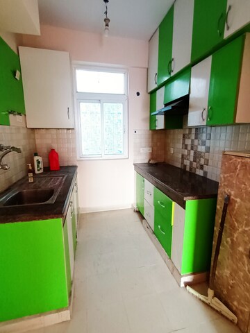 Kitchen in 2 BHK Apartment at Tulsiani Luvnest, Vrindavan Yojna – for Rent