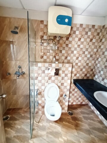 Bathroom in 4 BHK Apartment at Ansals Celebrity Greens, Sushant Golf City – for Rent