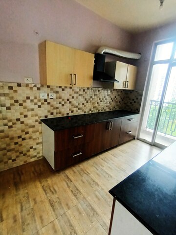 Kitchen in 4 BHK Apartment at Ansals Celebrity Greens, Sushant Golf City – for Rent