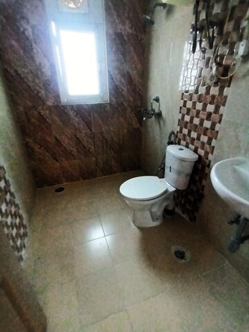Bathroom in 4 BHK Apartment at Ansals Celebrity Greens, Sushant Golf City – for Rent