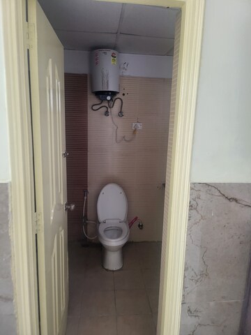 Bathroom in 3 BHK Apartment at SVP Gulmohur Greens, Mohan Nagar – for Rent