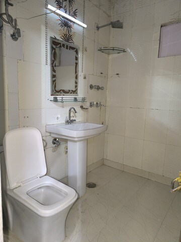 Bathroom in 2.5 BHK Apartment at Vasant Kunj – for Rent