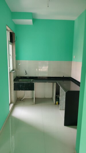 Kitchen in 1 BHK Apartment at Vijay Vatika, Kavesar – for Sale