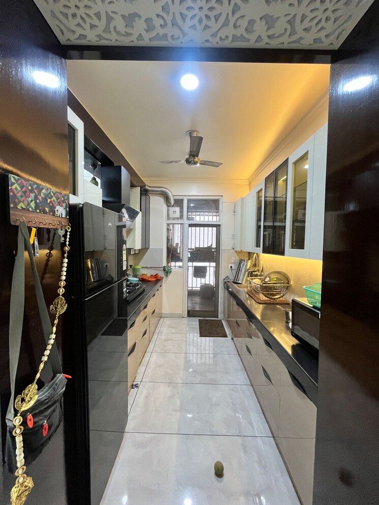 Kitchen, crossing-republik 3 Bedroom 1650 Sq.Ft. Apartment In Crossing Republic Ghaziabad 9127463
