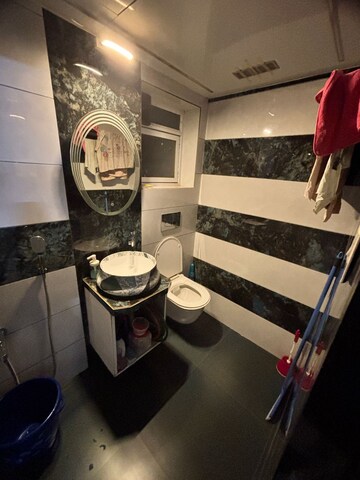 Bathroom in 1 BHK Apartment at HDIL Dheeraj Diamond, Malad West – for Rent
