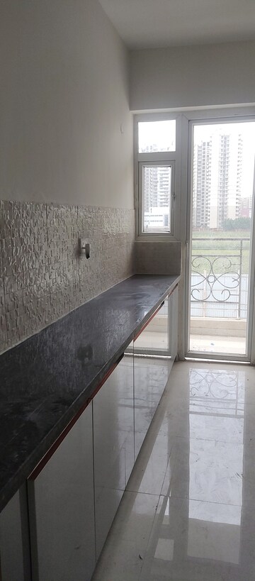 Kitchen in 2 BHK Apartment at Signature The Millennia 2, Sector 37d – for Rent