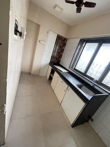 Kitchen in 2 BHK Apartment at Yasmin Tower, Agripada – for Sale