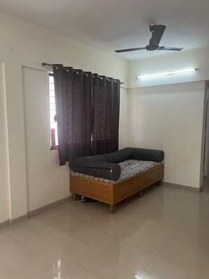 Living Room in 2 BHK Apartment at Kolte Patil Umang Pride, Wagholi – for Sale