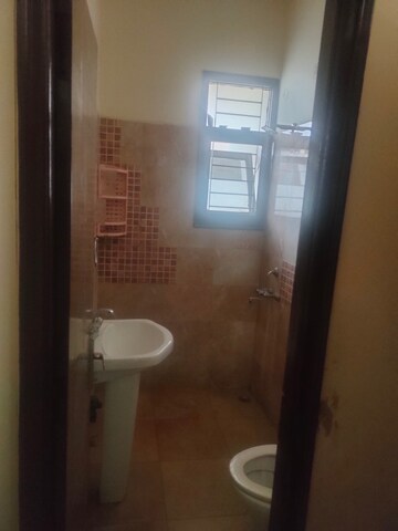 Bathroom in 3 BHK Apartment at Guru Nanak Enclave, Dhakoli – for Rent