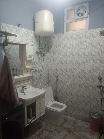 Bathroom in 3 BHK Builder Floor at Khirki Extension – for Sale
