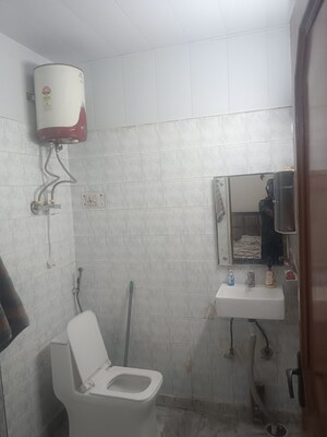 Bathroom in 3 BHK Builder Floor at Khirki Extension – for Sale