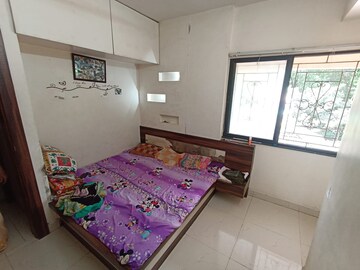 Bedroom in 1 BHK Apartment at Sagar D Wisteria Park, Vadgaon Budruk – for Rent