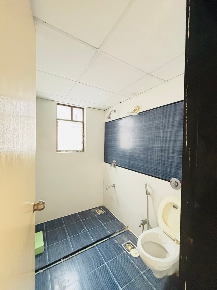 Bathroom, aastha-chs-wakad 2 Bedroom 750 Sq.Ft. Apartment In Wakad Pune 9128194