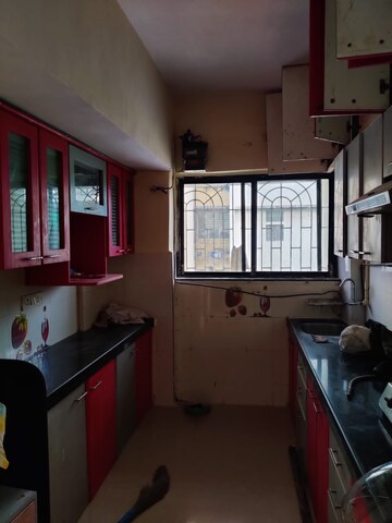 Kitchen in 2 BHK Apartment at New Mrugnayan Chs, Kharghar – for Rent