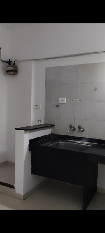 Kitchen in 2 BHK Apartment at Triaa Kosmic Kourtyard, Wagholi – for Rent
