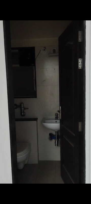 Bathroom in 2 BHK Apartment at Triaa Kosmic Kourtyard, Wagholi – for Rent