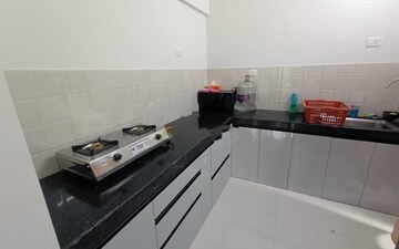 Kitchen in 2 BHK Apartment at Shapoorji Pallonji Sensorium, Hinjewadi – for Rent