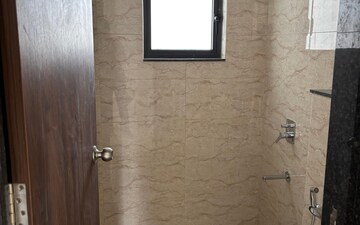 Bathroom in 2 BHK Apartment at Shapoorji Pallonji Sensorium, Hinjewadi – for Rent