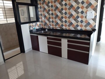 Kitchen in 2 BHK Apartment at Sargam CHS Nanded, Sinhagad Road – for Rent