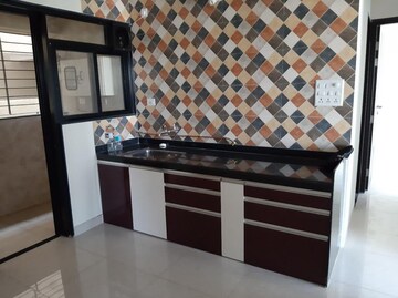 Kitchen in 2 BHK Apartment at Sargam CHS Nanded, Sinhagad Road – for Rent