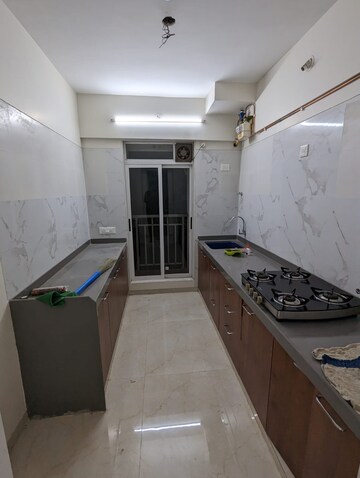 Kitchen in 2 BHK Apartment at Vihang Vermont, Ghodbunder Road – for Rent