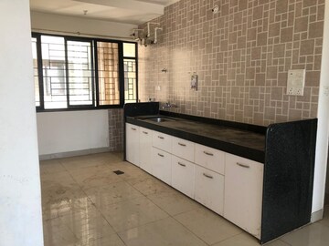 Kitchen in 2 BHK Apartment at Sargam CHS Nanded, Sinhagad Road – for Rent