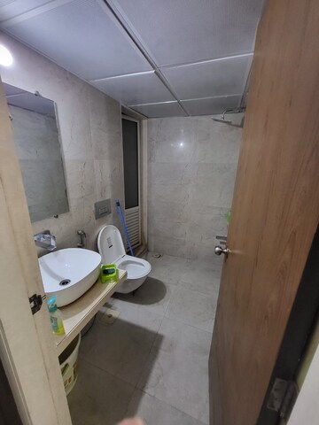 Bathroom in 1.5 BHK Apartment at Dosti West County, Balkum Pada – for Rent