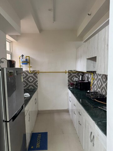 Kitchen in 3.5 BHK Apartment at Jaypee Wish Town Klassic, Sector 134 – for Rent