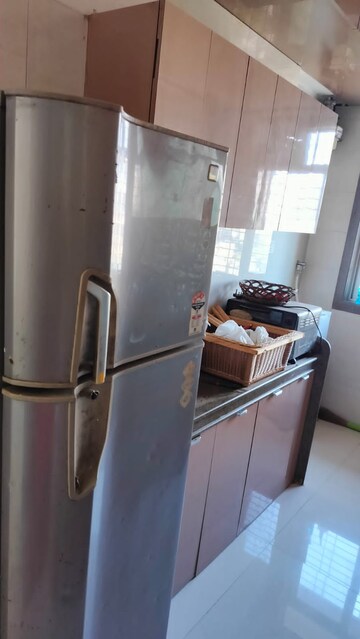 Kitchen in 2 BHK Apartment at Aditya Plaza Malad, Malad West – for Rent