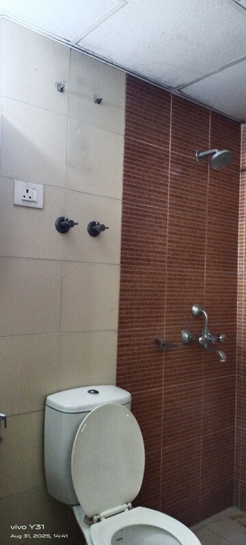 Bathroom in 2.5 BHK Apartment at Mahagun Mywoods, Sector 16c Greater Noida – for Rent