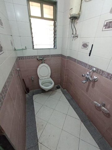 Attached Bathroom in 1 BHK Apartment at Conwood Astoria, Goregaon East – for Rent