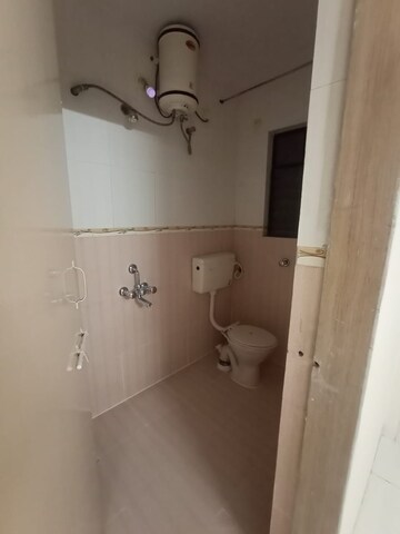 Bathroom in 2 BHK Apartment at Om Trimurti CHS, Dattawadi – for Rent